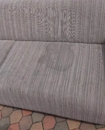Fabric couch before cleaning
